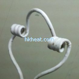 double ear shape induction coil for tempering titanium