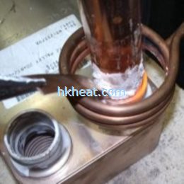 this illustration shows how the connecting sleeve of a plate heat exchanger is inductively brazed on