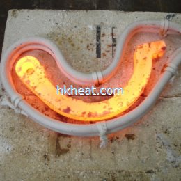 induction heating treatment for cambered steel
