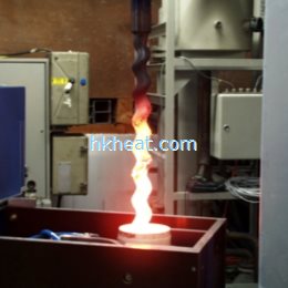 induction rotor heating prior to spray weld