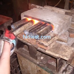 induction forging steel billets and rods by manual